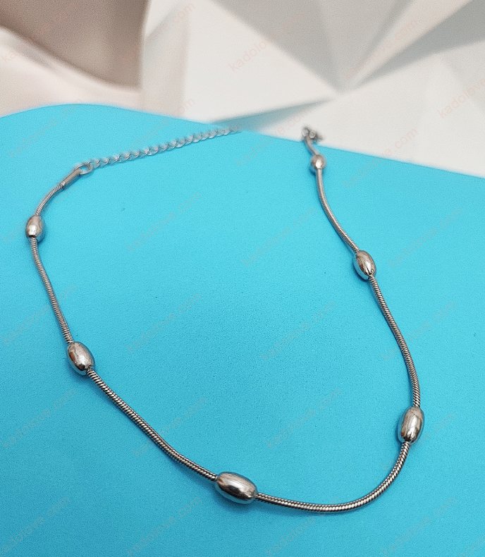 پابند مهره بیضی نقره ای پابند استیل زنانه